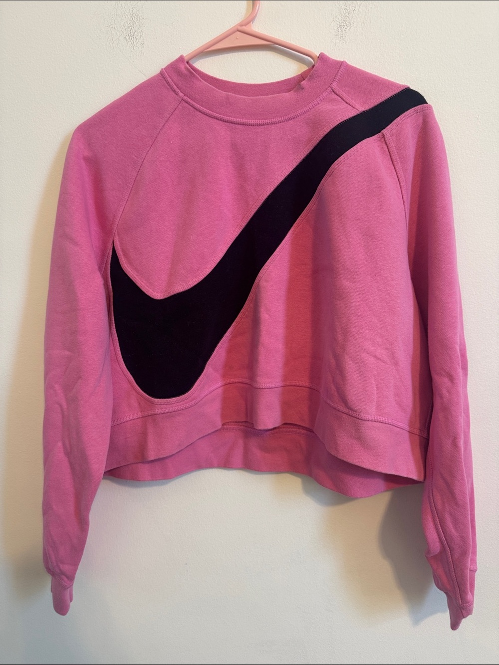 Nike Pink Crew Sweatshirt with Large Black Swoosh Accent